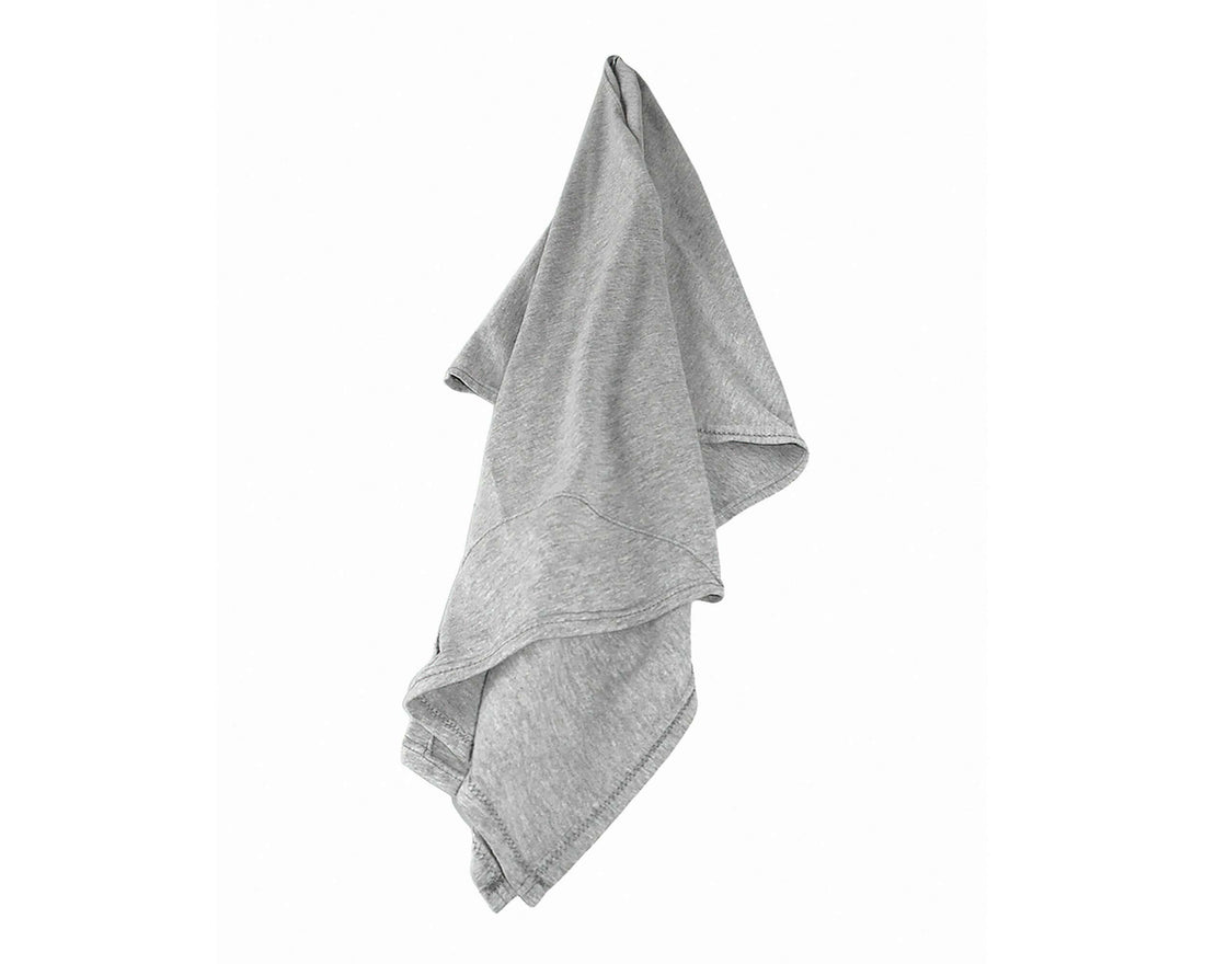 woman using T-Shirt Hair Towel for Curly, Wavy, and Straight Hair - Soft, Absorbent, and Eco-Friendly in Heather Gray