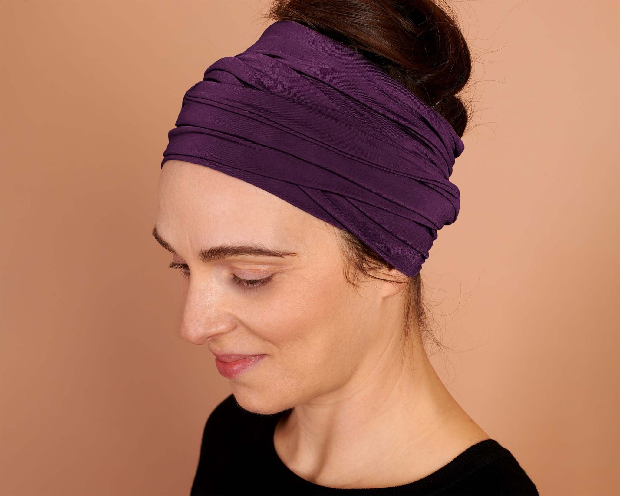 Woman wearing a Boho Head Wrap Wide Hair Wrap in Italian Plum