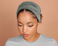 woman wearing a Boho Headband Extra Wide in Cypress Green