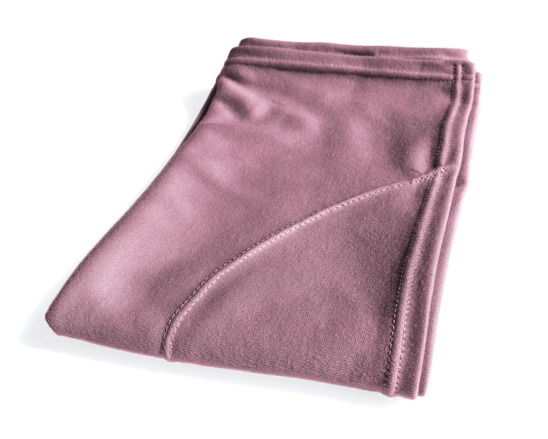 woman using a T-Shirt Hair Towel for Curly, Wavy, and Straight Hair - Soft, Absorbent, and Eco-Friendly in lilac rose