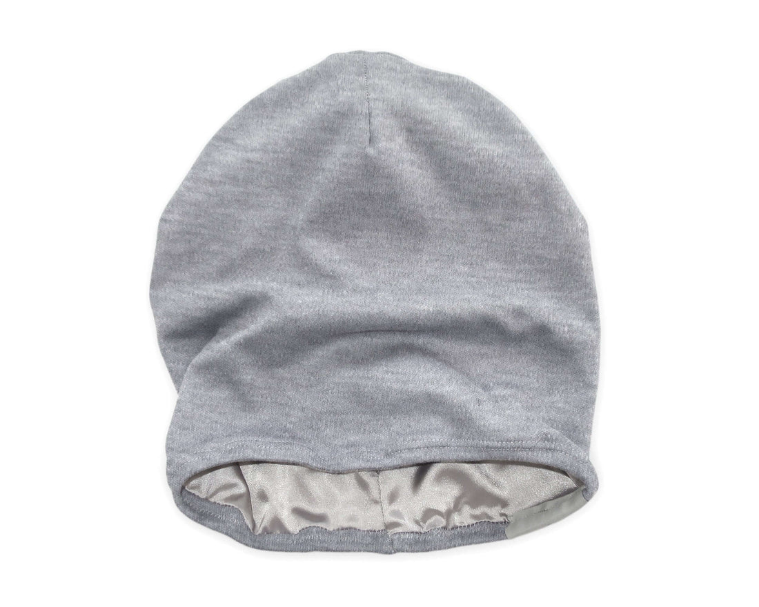 woman wearing a Satin-Lined Beanie for Women and Men - Soft and Warm Beanie with Satin Lining to Protect Hair in  Heathered Gray