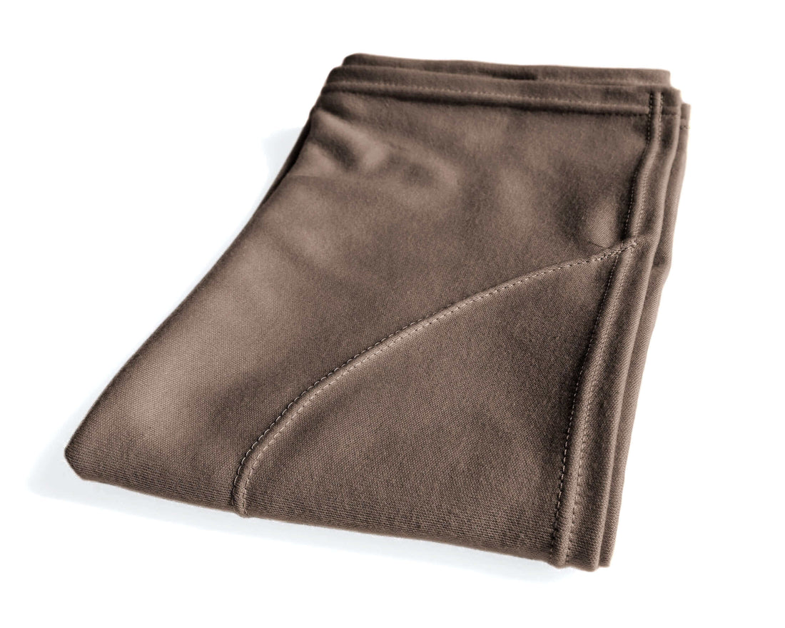 Mocha Mousse eco-friendly hair towel on a woman drying her hair for frizz-free results