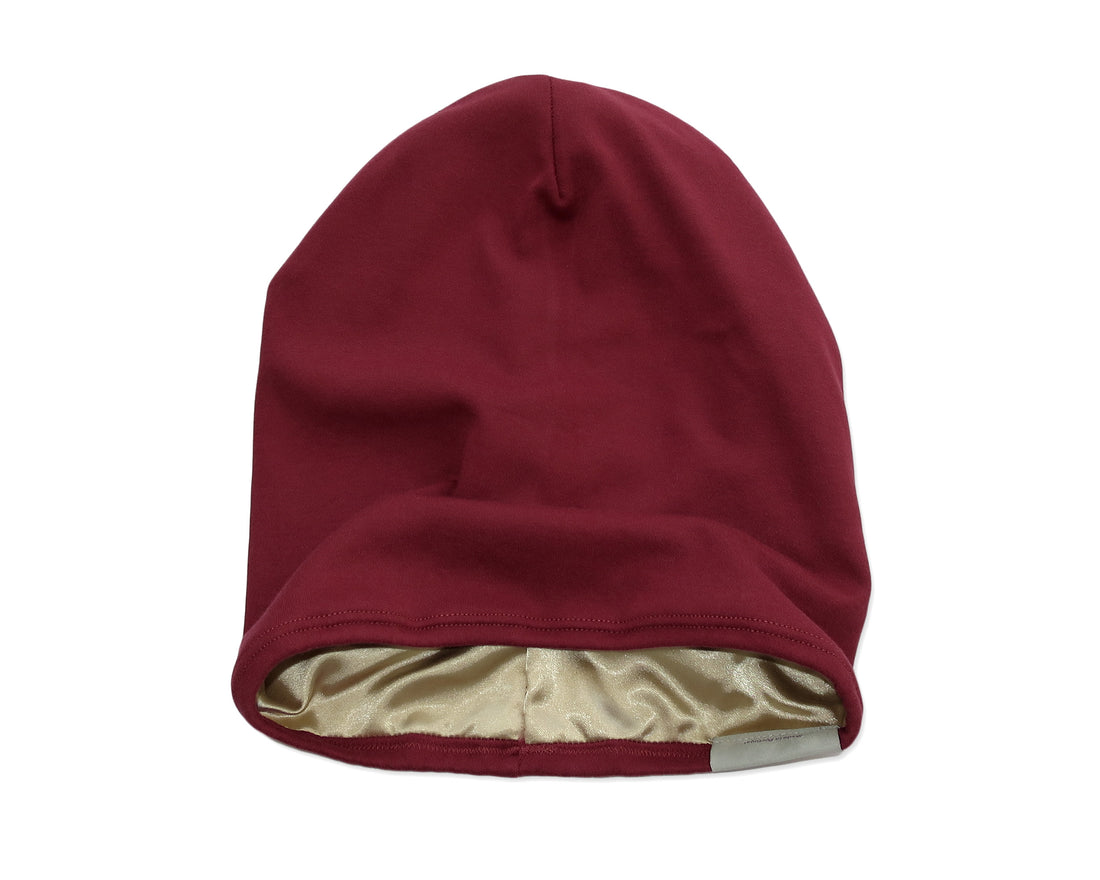 Woman wearing Red Satin-Lined Beanie for Women and Men - Soft and Warm Beanie with Satin Lining to Protect Hair